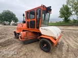 Used Broce Broom in yard